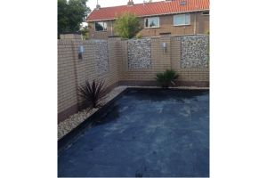 Gabione mit Yellow Sun Bruchstein – Gabionen